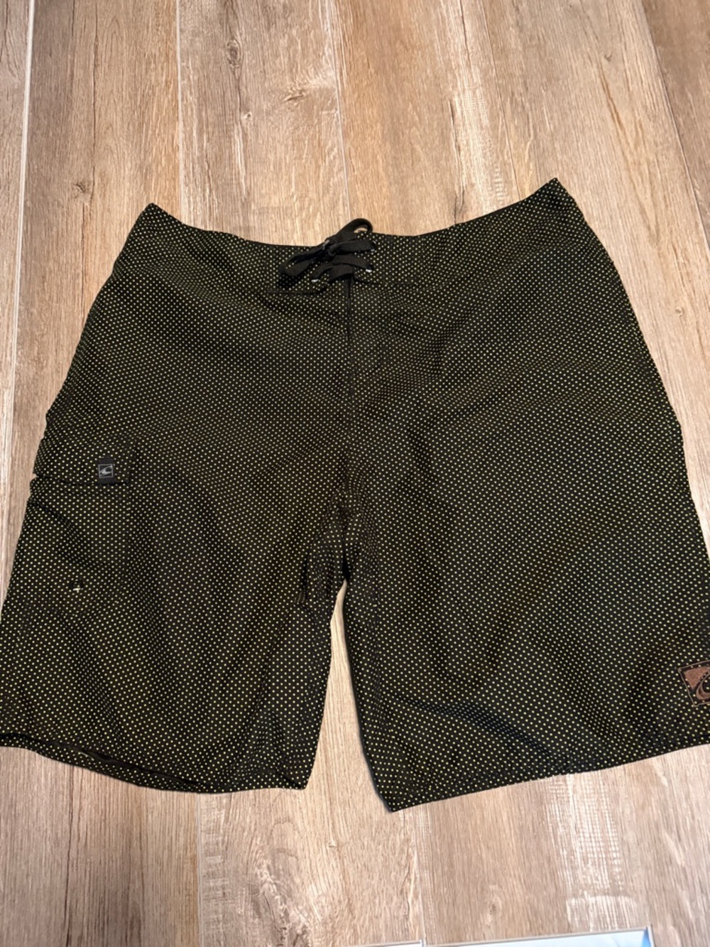 O'Neill Black Swim Board Shorts with Green Microdot Pattern